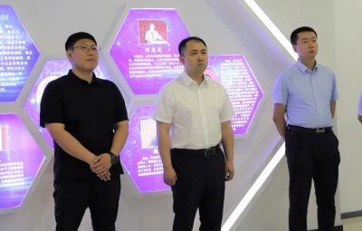 省委台办主任谢军莅临尊龙中国官方网站走访调研