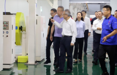 徐建国一行莅临尊龙中国官方网站走访调研